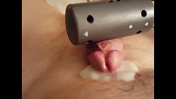 A vibrator on my cock causes a quick orgasm and spew of thick cum