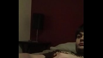 steaming nineteen year aged boy tugging on his couch